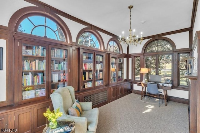 carpeted office space with baseboards, an inviting chandelier, and crown molding