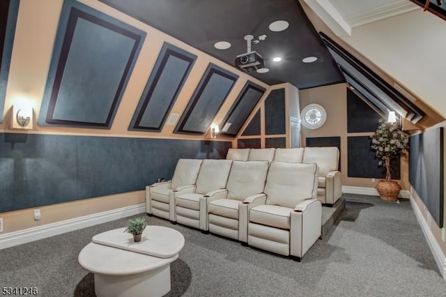 home theater room featuring carpet and baseboards