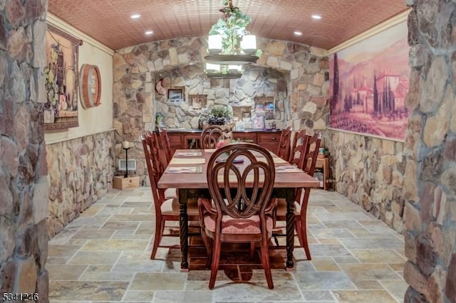 dining area with recessed lighting and stone tile floors