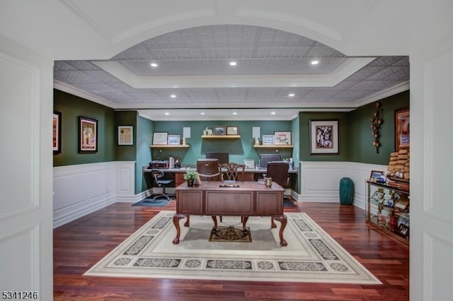 office space featuring ornamental molding, a wainscoted wall, and wood finished floors