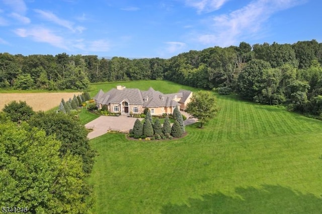 aerial view with a wooded view