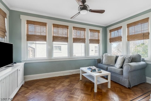 sunroom with ceiling fan