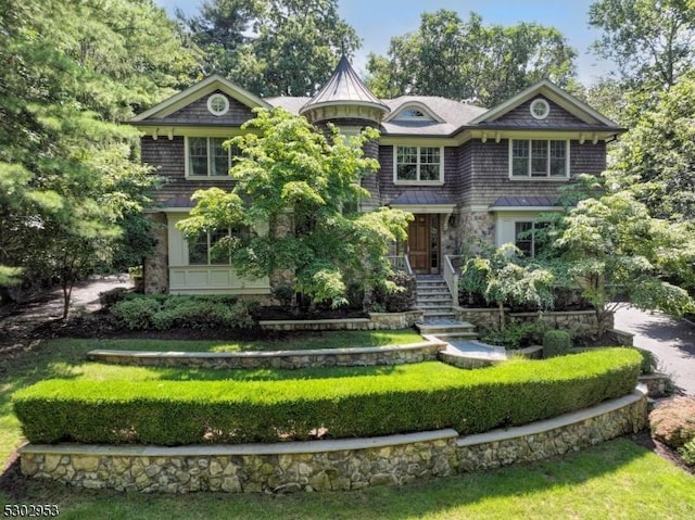 view of front of home with a standing seam roof and metal roof