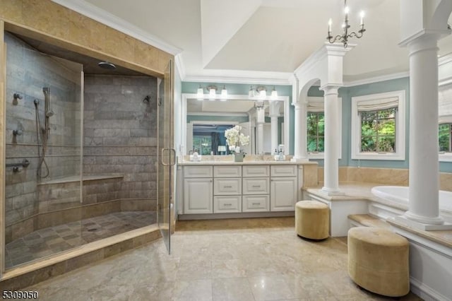 full bathroom with ornamental molding, a stall shower, and decorative columns