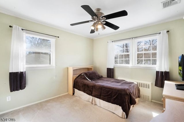 bedroom with multiple windows, visible vents, and carpet floors