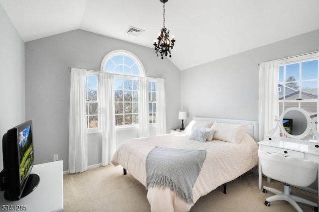 bedroom with visible vents, baseboards, vaulted ceiling, light carpet, and an inviting chandelier