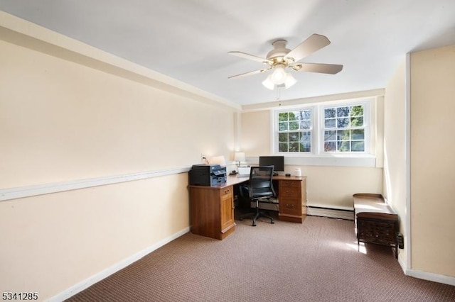 office area featuring light colored carpet, a baseboard heating unit, baseboards, and ceiling fan