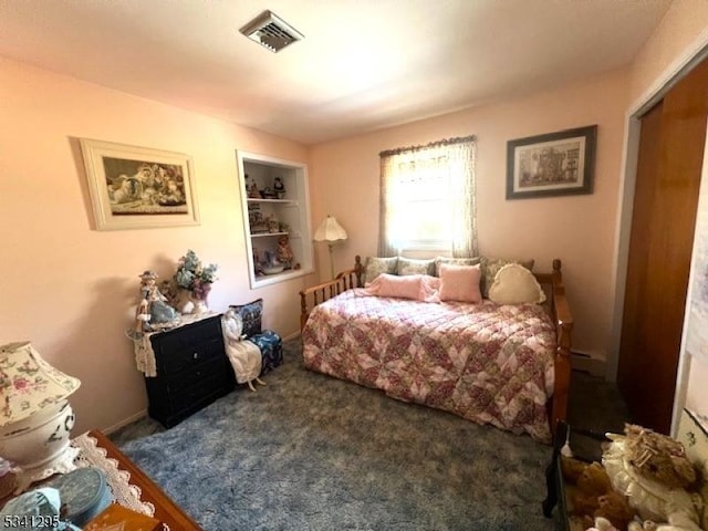 bedroom with carpet and visible vents