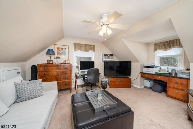 living area featuring light carpet, ceiling fan, baseboards, and vaulted ceiling