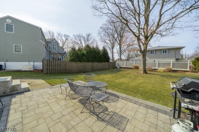 view of patio featuring outdoor dining space and fence