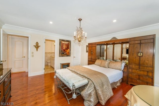 bedroom with ornamental molding, wood finished floors, and recessed lighting