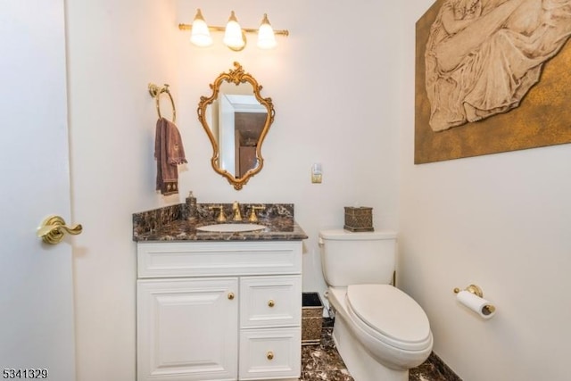 half bath with toilet and vanity