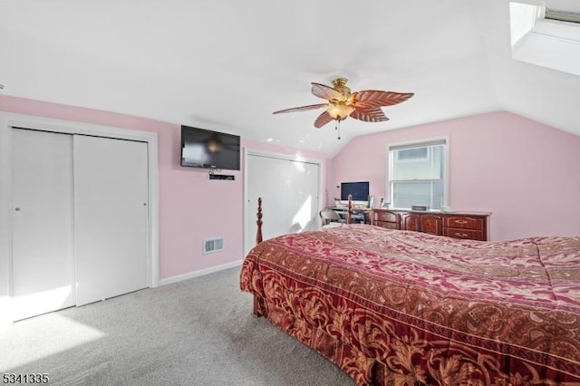 bedroom with visible vents, baseboards, lofted ceiling, ceiling fan, and carpet