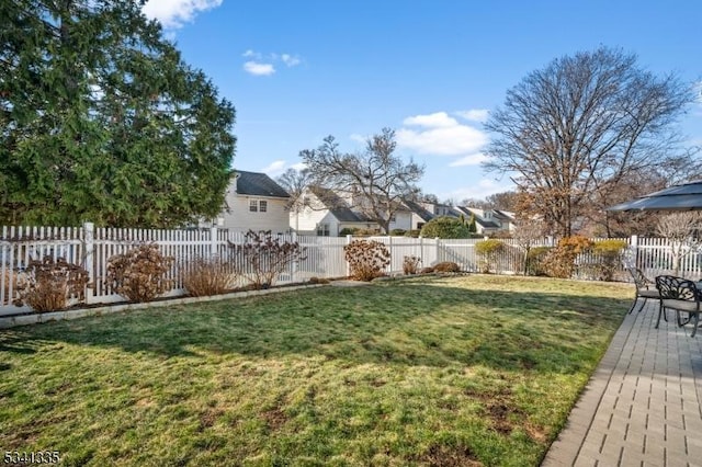 view of yard with a fenced backyard