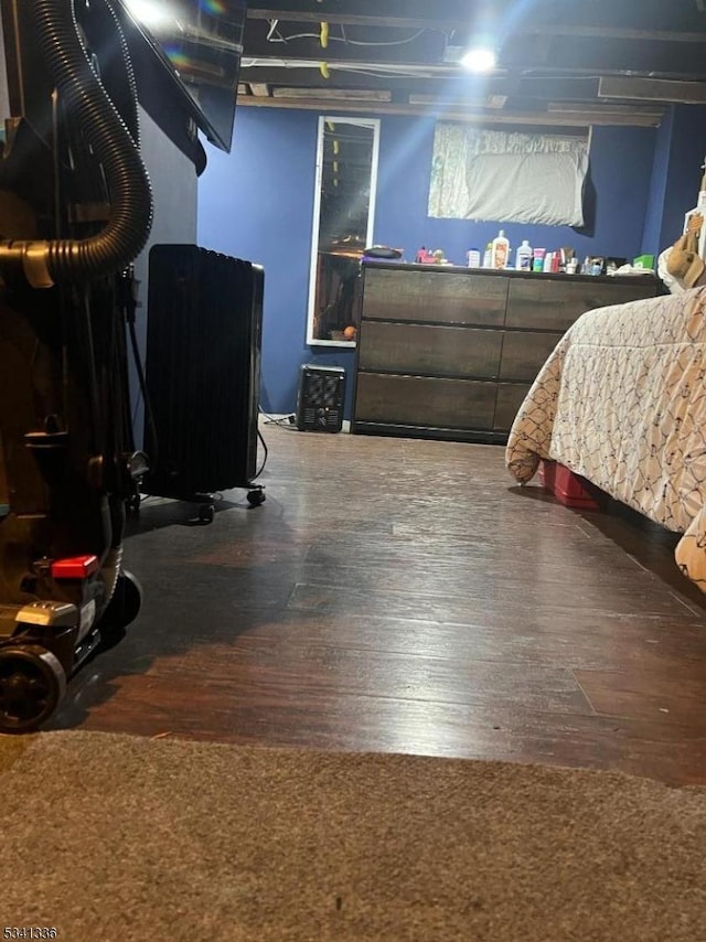 bedroom featuring wood finished floors