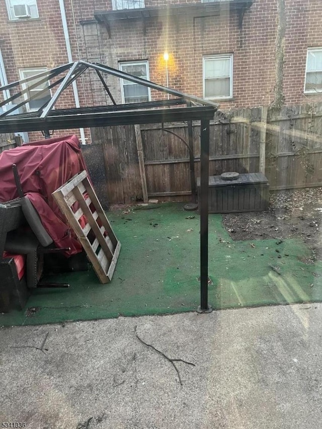 view of jungle gym with fence