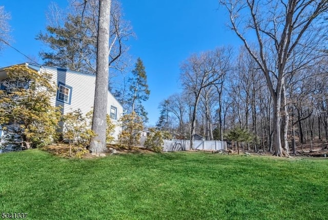 view of yard with fence