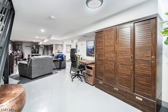 office featuring finished concrete flooring and recessed lighting