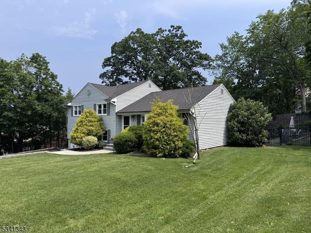 4 Dorrien Rd, Livingston Twp, NJ 07039 - view of front facade with a shingled roof