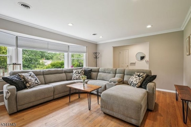 4 Dorrien Rd, Livingston Twp, NJ 07039 - living room featuring healthy amount of natural light, ornamental molding, light wood-type flooring, and recessed lighting
