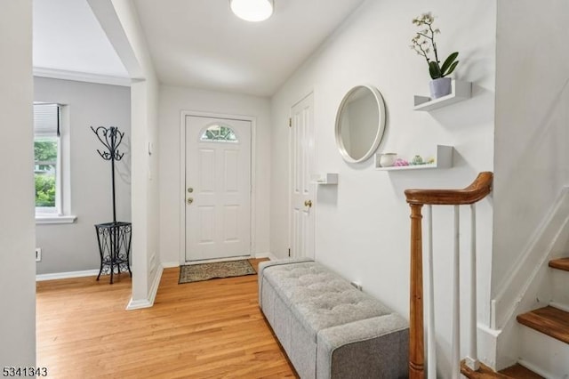 4 Dorrien Rd, Livingston Twp, NJ 07039 - entrance foyer with light wood-type flooring and stairway