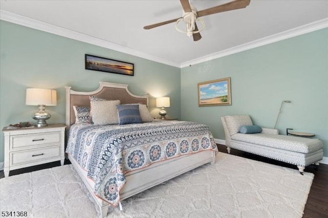 bedroom with a ceiling fan, baseboards, ornamental molding, and wood finished floors