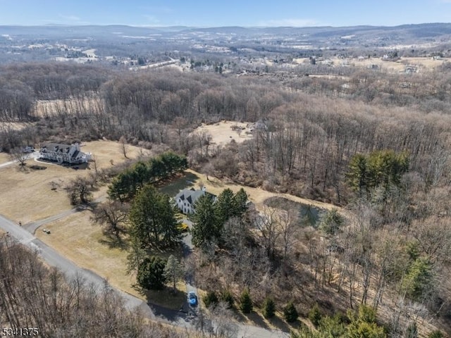 aerial view featuring a view of trees