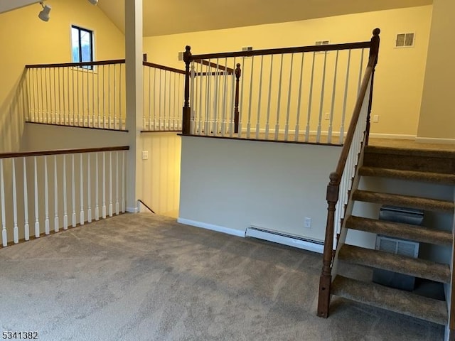 view of stable featuring a baseboard radiator and visible vents