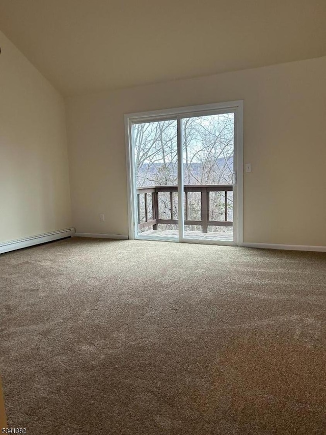 carpeted empty room with a baseboard heating unit and baseboards