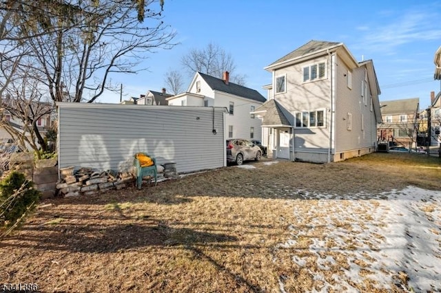 rear view of house featuring a residential view