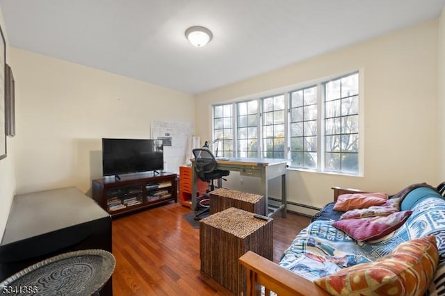 living room featuring baseboard heating and wood finished floors