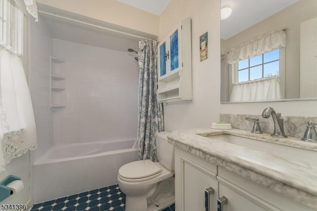 bathroom with shower / tub combo, vanity, and toilet