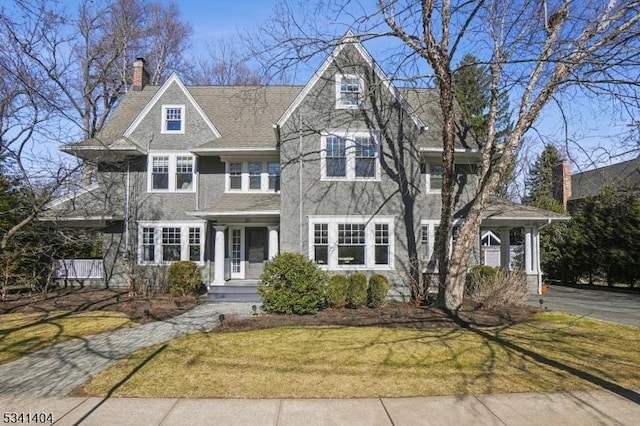 shingle-style home with a chimney