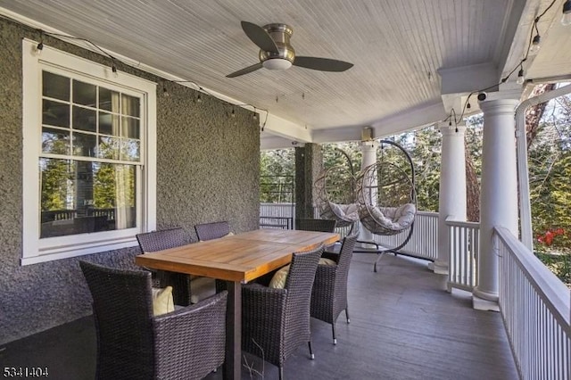 view of patio / terrace with outdoor dining space and a ceiling fan