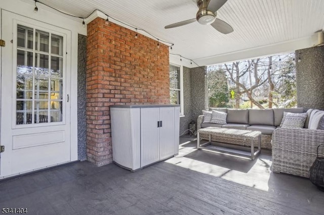 view of patio featuring outdoor lounge area and ceiling fan