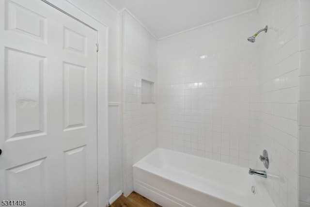 bathroom with shower / tub combination