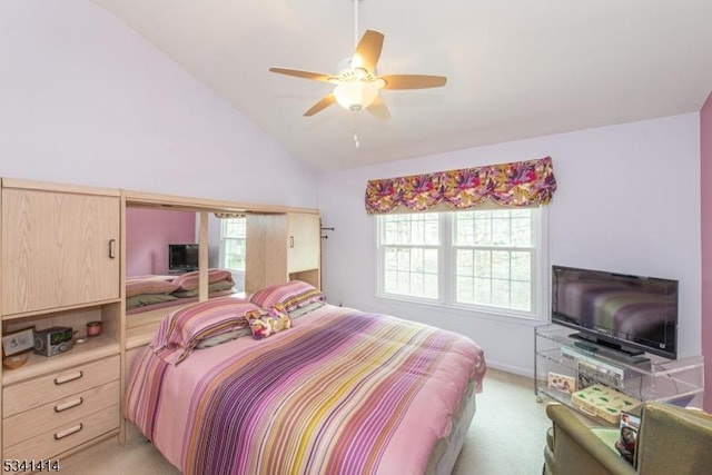 bedroom featuring light carpet, high vaulted ceiling, and a ceiling fan