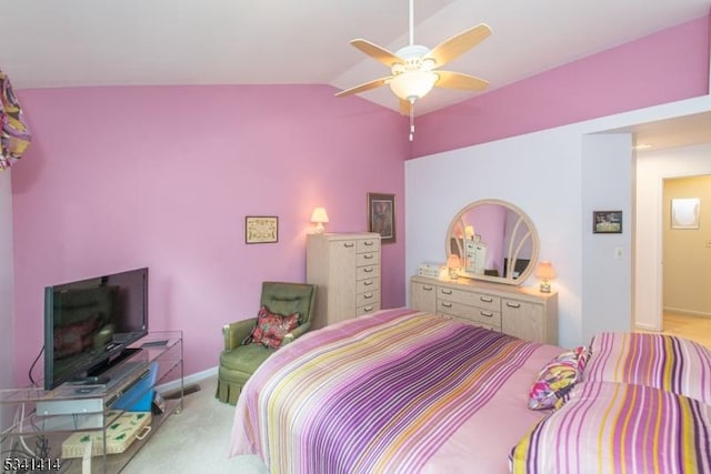 carpeted bedroom with visible vents, ceiling fan, baseboards, and lofted ceiling