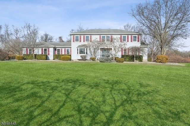 view of front of house with a front lawn