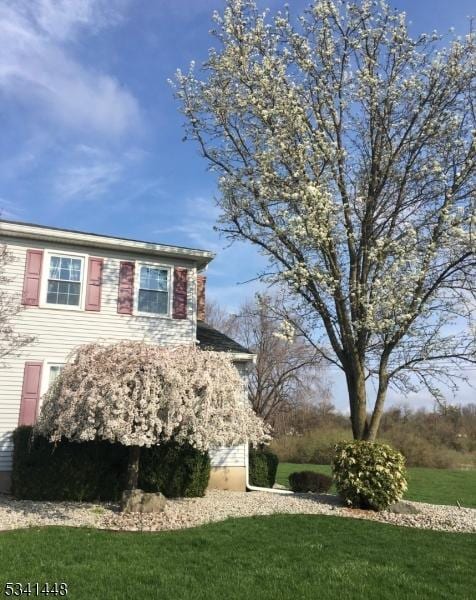 view of home's exterior featuring a lawn