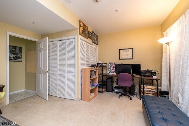 tiled home office with baseboards