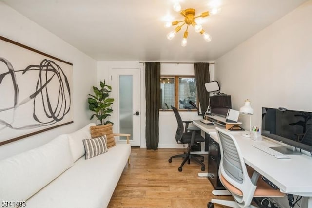 office area with light wood-style floors