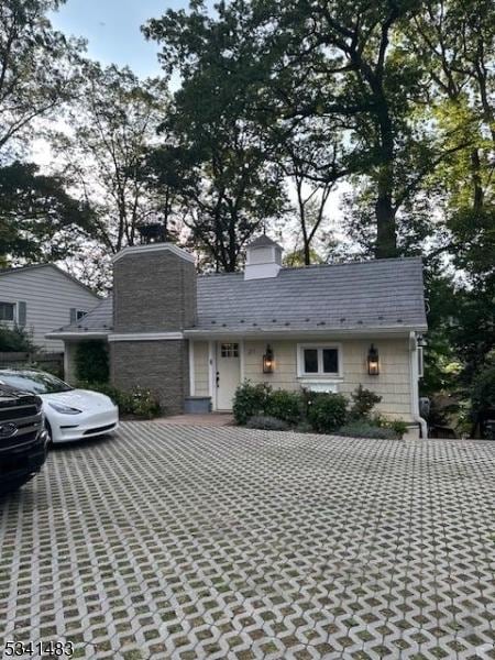 view of front of property with a chimney