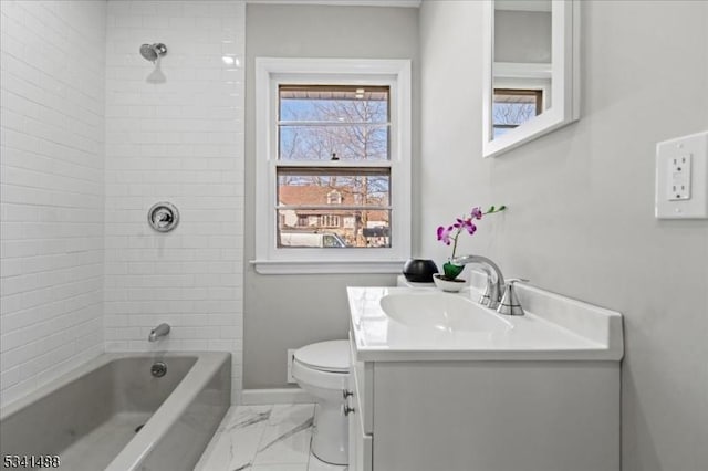 full bathroom with marble finish floor, shower / bath combination, toilet, vanity, and baseboards