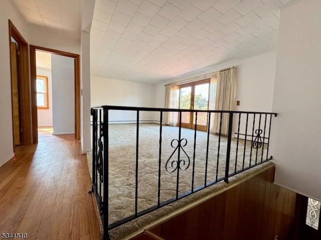 hallway with wood finished floors