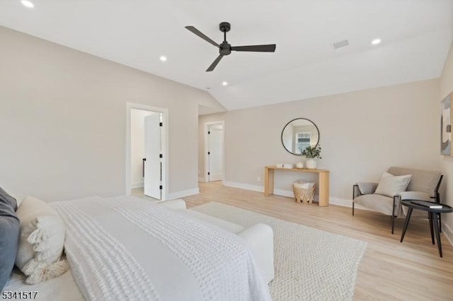 bedroom featuring recessed lighting, light wood-type flooring, lofted ceiling, and visible vents