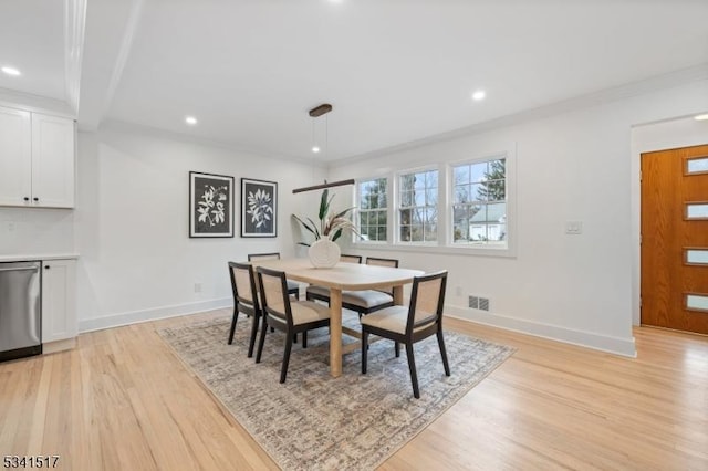 dining room with recessed lighting, light wood-style floors, and visible vents