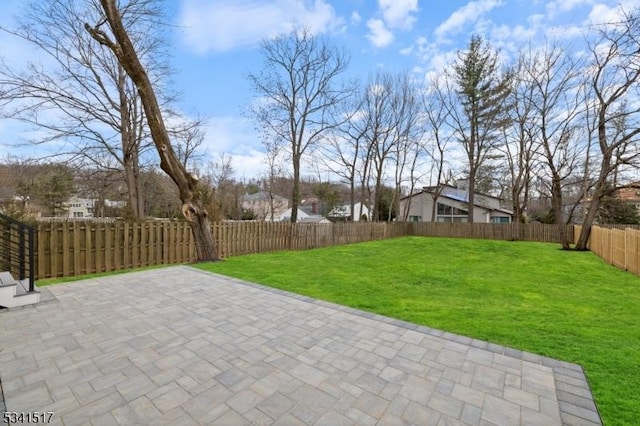 exterior space with a fenced backyard