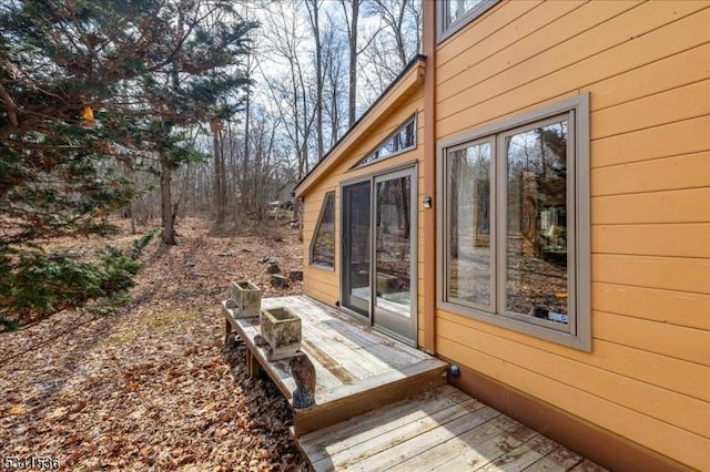 view of home's exterior featuring a deck