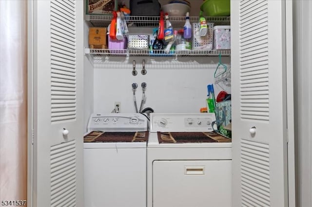 washroom with laundry area and separate washer and dryer